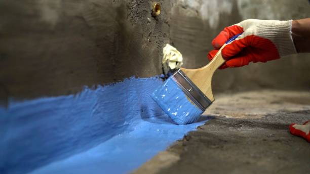 SJ Waterproofing Pros commercial waterproofing team near Raymond, KS